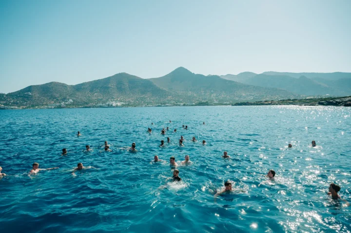 Swim stop on the Malia Booze Cruise – clear blue water, sun blazing and everyone cooling off before the party kicks back off.