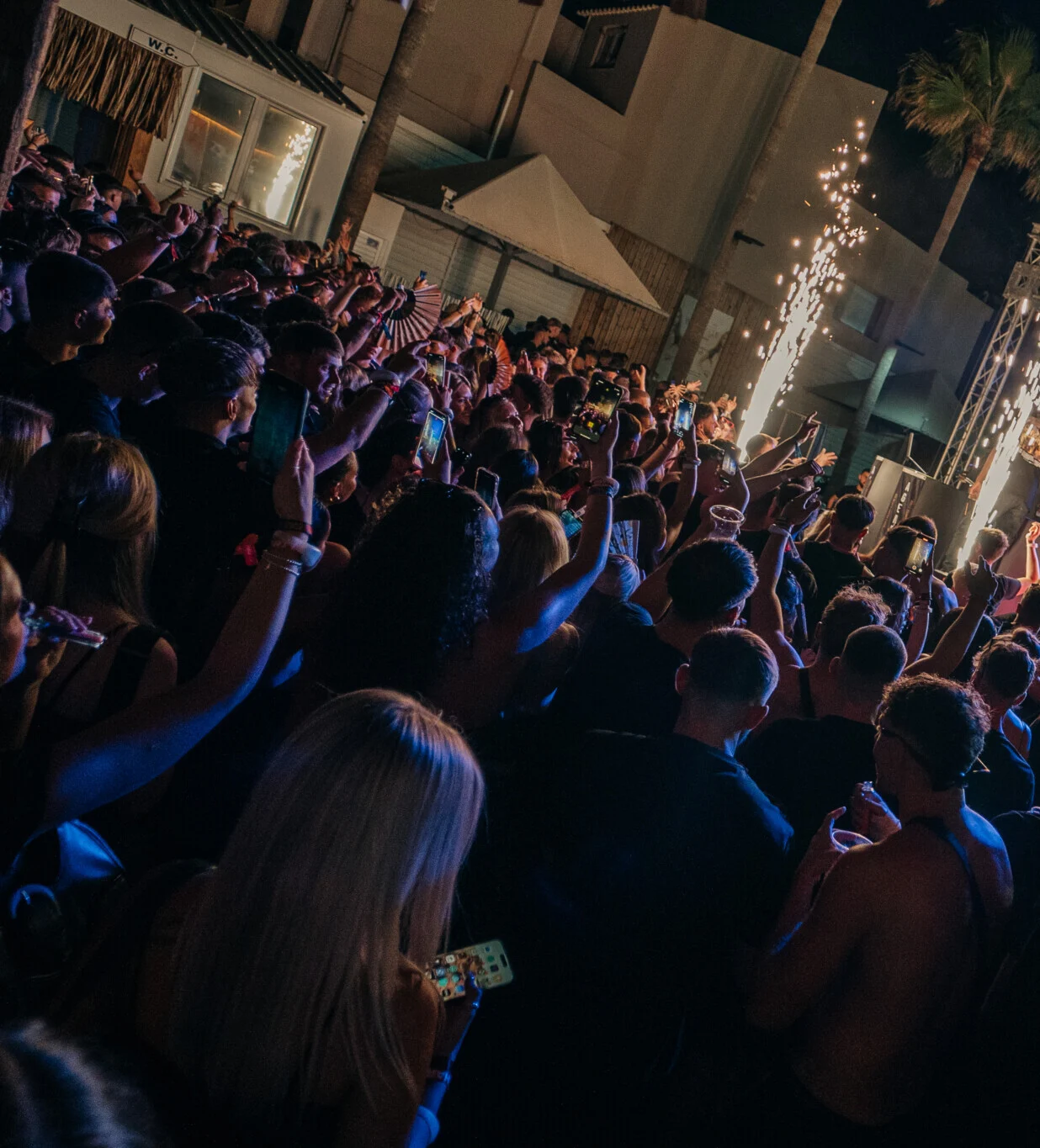 Crowds going off at Agenda Club Malia, packed outdoor stage with fireworks, lights and unreal summer party energy.